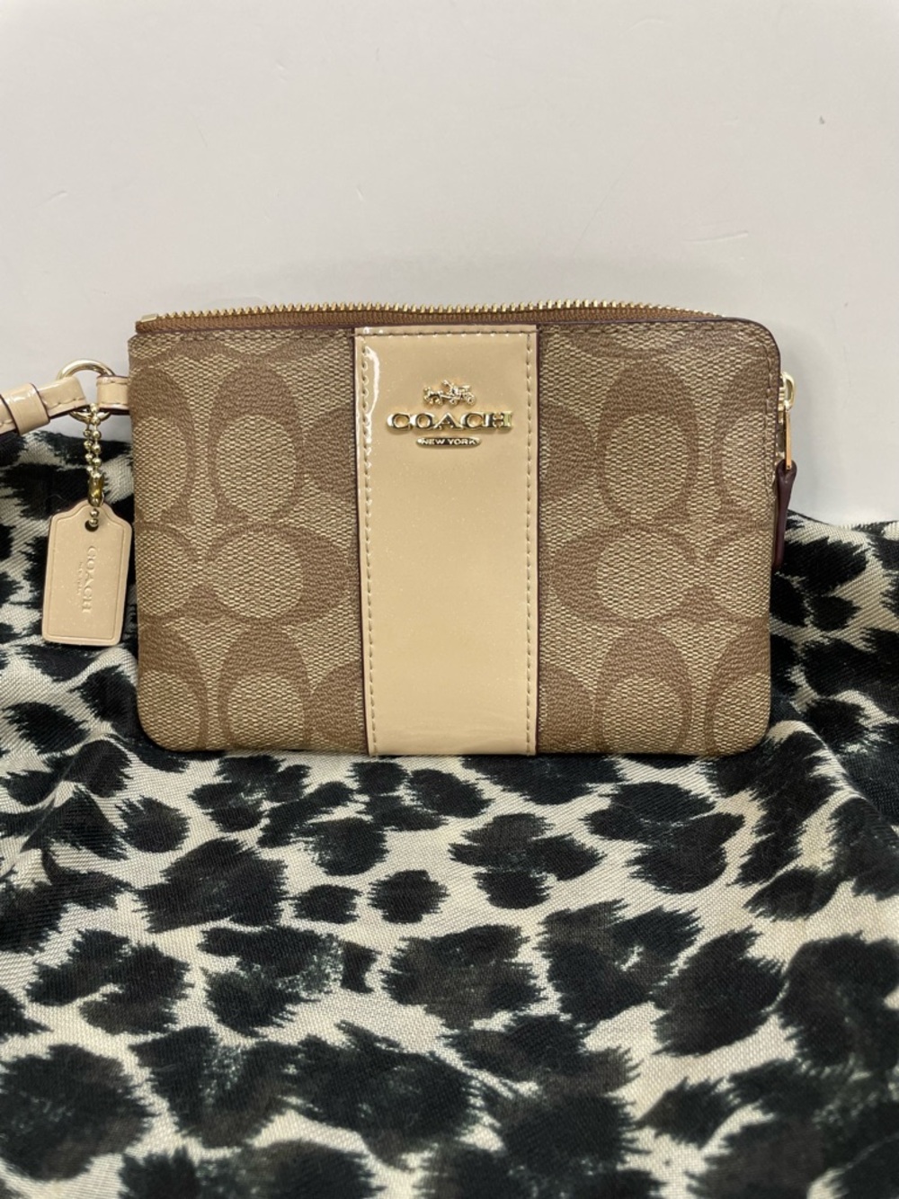 Coach Signature Zip Wristlet in Brown and Cream
